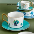 Set tazzina da caffè in ceramica con occhio, manico dorato e piattino turchese - Piattino Verde Malocchio Floreale