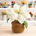 Handmade crochet white lily potted plant with yellow stamens on wooden table - White