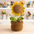 Handmade crochet sunflower in a brown pot with cute ladybug and mushroom accents - Sunflower