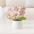 Handmade pink crochet forget-me-not flower in a white ceramic pot for home decor - Pink