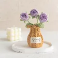 Handmade crochet purple rose flowers in a knitted vase for home desktop decoration - Purple Rose