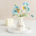 Handmade crochet blue and white tulip potted flower in a knit vase for home decor - Blue Orchid