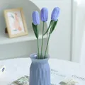 Three handmade purple knitted tulips in a blue textured glass vase for home decoration - Light Blue
