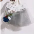Detailansicht klarer Geschenktüten mit weißem Papierkopf und geflochtenen Griffen in Fächerform - Geschenktüte Für Topfpflanzen (20*15cm)