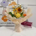 Detail of handmade crochet sunflower bouquet with champagne wrapping and ribbon - Sunflower-Yellow Series