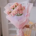 Handmade pink and white crochet carnation bouquet gift in elegant matte paper wrap - Gradient Pink
