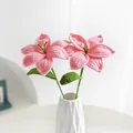 Handmade crochet pink lily flower set with green leaves in a white ceramic vase - Pink