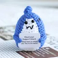 Detail of crochet emotional support shark holding motivational card in blue and white yarn - Emotional Support Shark / Blue (Shark)