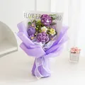 Handcrafted crochet flower bouquet featuring purple roses and daisies with lavender wrapping - Purple Rose Series 3