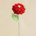 Handmade crochet peony flower in vibrant red with detailed green leaves for home decor - Red