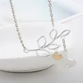 Minimalist clavicle necklace with silver branch and two-tone gold and silver birds pendant - One Bird Style (XL121-1)