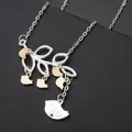 Macro view of silver tree branch necklace with five gold birds and large bird pendant - Five Birds Style (XL121-5)
