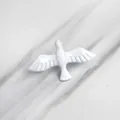 Minimalist white glossy ceramic dove brooch on a marble background texture - White Peace Dove Style (XZ0232)