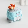 Blue hand-knitted dumpster fire doll with cute facial expression and support card - Blue Dumpster Fire