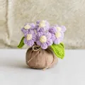 Close-up of handmade crochet flower pot with purple puff flowers and jute base decor - Purple Lucky Bag Multi-flower Puff Flower