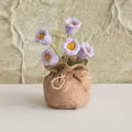 Detailed view of handmade purple crochet lily of the valley in a rustic burlap sack pot - Purple (5 Heads)