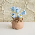Close-up of handmade crochet lily of the valley in a rustic burlap sack pot - Blue (5 Heads)
