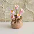 Detail of pink crochet Lily of the Valley potted plant with brown burlap base decoration - Pink (5 Heads)