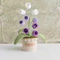 Handmade crochet lily of the valley plant with purple petals and pearl accents - Gradient Purple Lily Of The Valley Shape