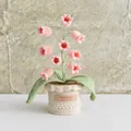 Pink crochet lily of the valley potted plant with handmade leather label on white table - Lily of the Valley Pink
