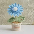 Handmade crochet light blue flower in a beige woven pot with ladybug detail - Sunflower Shape-Blue
