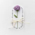 Hand-crocheted purple flower with Love Is Eternal ribbon on decorative gift card - Carnation / 1 Piece (With Handbag) / Deep purple