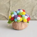 Handmade crochet rainbow flower pot with multi-color knit petals and burlap bag base - Multicolor Multi-flower Puff Flower