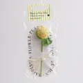 Handgefertigte gehäkelte gelbe Rose mit grünen Blättern in hochwertiger Geschenkverpackung - Gelbe Rose