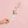 Handmade crochet lily of the valley in pink yarn with green leaves and ribbon wrap - 7-Head Forget-Me-Not Pink