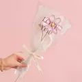Handmade crochet daisy flower bouquet in pink and white with festive gift wrapping - Cosmos Pink Gradient