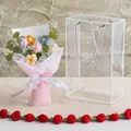 Handmade crochet flower bouquet in a clear acrylic gift box with multi-colored carnations - Pink Puff Flower Series (Medium Gift Box)