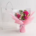 Handmade crochet flower bouquet with red roses and pink daisies in a clear gift bag - Carnation Mix - Pink Series