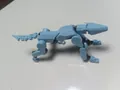 Light blue 3D printed robotic wolf action figure with articulated joints on white table - Blue Police Dog