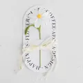 Handmade crochet white daisy with yellow center and green stem featuring a silk ribbon - Galsang Flower / 1 Piece (With Handbag) / White