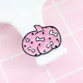 Detail of pink enamel shark brooch with glitter finish and bone patterns for Halloween - Pink Bone Pumpkin (XZ0276)