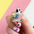 Detailed close-up of a colorful enamel map brooch with an airplane and location pins - Gold Edge Macaron Map Style(XZ0967)