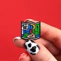 Detailed close-up of a folding travel map enamel pin with a red location pin and airplane - Black Edge Bright Map Style(XZ0968)