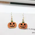 Halloween pumpkin lantern drop earrings with orange enamel finish and gold hooks - Jack-O'-Lantern Style (EAR2595)