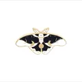 Black and white moth enamel pin with celestial sun and moon patterns in gold finish - Black and White Celestial Moth (WY0705)
