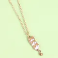 Close-up of golden necklace featuring a cute triple-stacked cartoon cat pendant with enamel finish - Three Stacked Cats Style (XL3711)