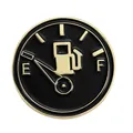 Macro shot of circular enamel gas gauge pin showing fuel needle pointing to empty - Car Fuel Gauge Style (W6943)