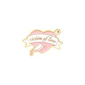 Detail of Victim of Love heart pin with dagger and pink enamel finish in gold plating - Pink Heart Victim Of Love Ribbon With Dagger
