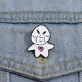 Cartoon enamel pin of Stray Kids Lee Know character on blue denim jacket pocket - Funny Figure Purple Heart Style (qhxz1090)
