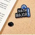 Black and blue Math Major enamel pin on cork background with academic book pages - Math Major Style (A16-4-585)
