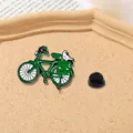 Retro green bicycle enamel brooch featuring a white bird and black rubber back pin - Green Bicycle Style (CZ0140)