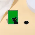 Green rectangle enamel pin with a black cat design and a matching black round clutch - Black Cat Back View Style (A16-6-626)
