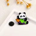 Detail of cute enamel panda brooch with sword on white background with dried flowers - Panda Holding Utility Knife Shape (CZ0528)