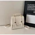 Fashionable cream-white college style backpack with gold metal hardware and top handle - No Pendant / Off White