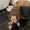 Mini plaid backpack with bear charm in brown and blue check pattern and shiny leather trim - Orange