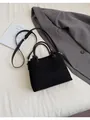 Piccola borsa quadrata nera in pelle scamosciata con doppi manici e tracolla regolabile - Nero